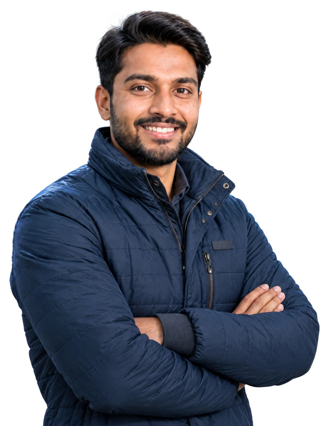 Indian cold-storage manager standing with arms crossed inside a potato cold storage